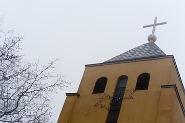 Image showing Church in the fog with star and cross