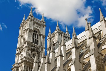 Image showing Refurbished temple in sunlight against blue sky