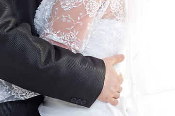 Image showing Married couple holding tight togather