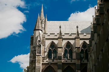 Image showing Refurbished temple in sunlight against blue sky