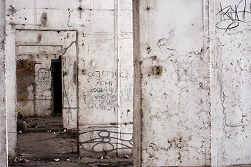 Image showing Abandoned building interior with white walls