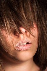 Image showing Girl with sugar on her lips