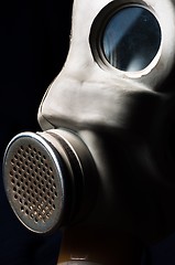 Image showing Dark gasmask on enlighted background