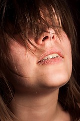 Image showing Girl with sugar on her lips