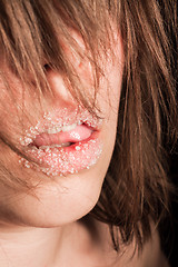 Image showing Girl with sugar on her lips