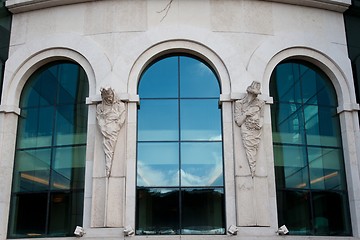 Image showing Modern windows with statues