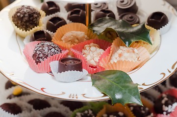 Image showing A plate of chocolates with other treats