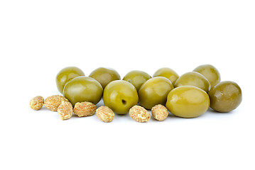 Image showing Green olives and some pits