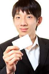 Image showing businessman with empty card in hand 