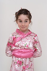 Image showing Cute smiling girl in Japanese masquerade costume