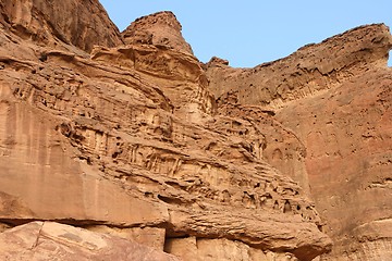 Image showing Orange weathered rocks in desert