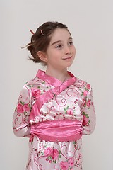 Image showing Cute smiling girl in Japanese masquerade costume