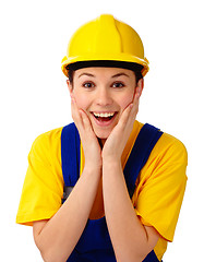 Image showing Construction girl holding her face in astonishment