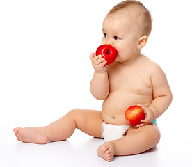 Image showing Little child with apple