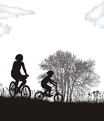 Image showing Mother and son on bikes