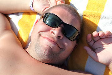 Image showing funny tourist face in sunglasses