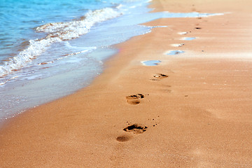 Image showing footprints on sand beach