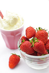 Image showing Bowl of strawberries with whipped cream
