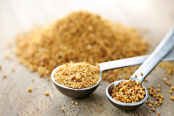 Image showing Coconut palm sugar in measuring spoons