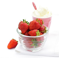 Image showing Bowl of strawberries with whipped cream