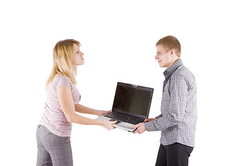 Image showing man and woman fighting over laptop
