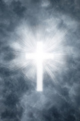 Image showing Religious cross shining through clouds