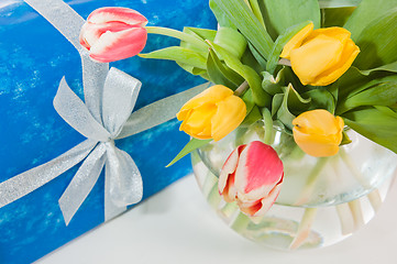 Image showing Bouquet of tulips and gift