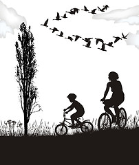 Image showing Son and mother on bikes