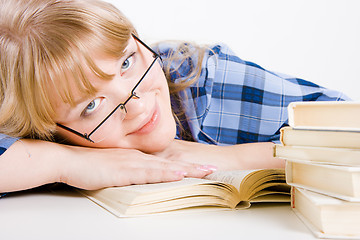 Image showing blonde in glasses with books