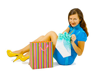 Image showing girl in a bright dress with shopping