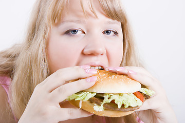 Image showing fat girl with a hamburger
