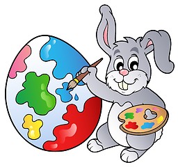 Image showing Bunny artist painting Easter egg