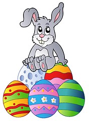 Image showing Bunny on pile of Easter eggs