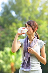 Image showing woman drink water after sport