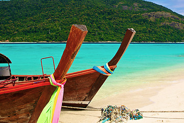 Image showing Paradise island and two boats in the green ocean