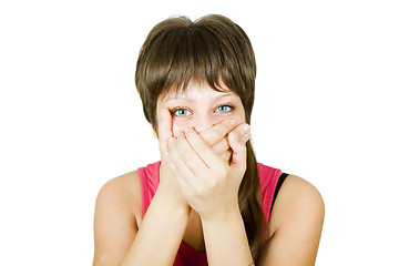 Image showing girl closes her mouth with her hands