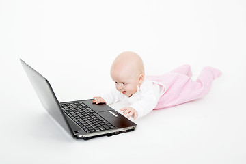 Image showing baby playing on the computer