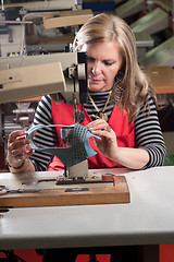 Image showing Sewing worker