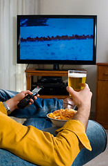 Image showing Watching television