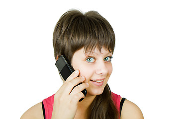 Image showing smiling beautiful girl with a phone