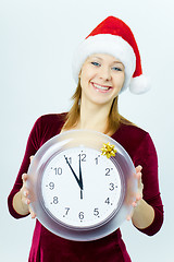 Image showing a smiling girl with a watch in his hand