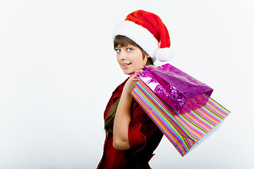 Image showing blue-eyed girl with a New Year Shopping