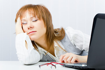 Image showing worker, asleep on a laptop