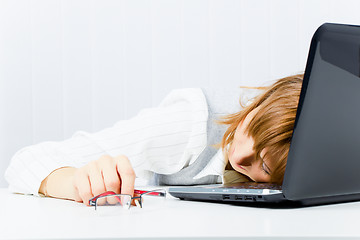 Image showing worker, asleep on a laptop