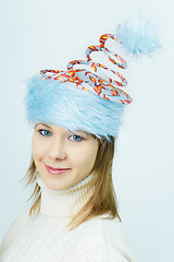 Image showing portrait of smiling girl in Christmas hats