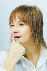 Image showing portrait of a beautiful girl wink