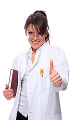 Image showing Female doctor holding a notebook