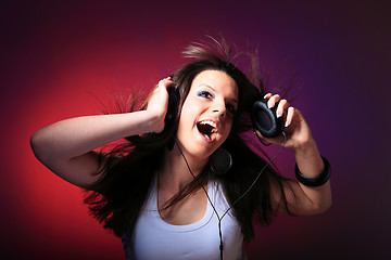 Image showing girl enjoys music