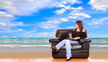 Image showing Young woman on couch