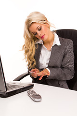Image showing Bored businesswoman in front of computer